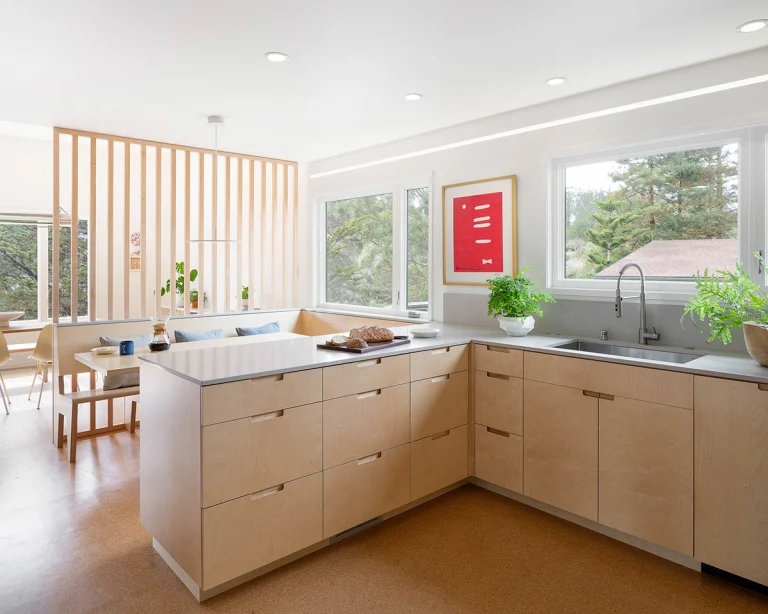 diamond heights eichler san francisco mid century modern sustainable remodel kitchen counter quartz solid surface cork flooring wood slat screen banquette breakfast bar copy 768x614