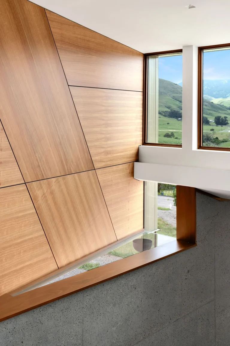 El Halcon modern interior pop out window modern wood paneling mitered glass window sand blasted concrete san luis obispo custom residence 21 768x1151